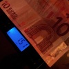 Inflation, Zinsen und die Börse Geld auf Waage